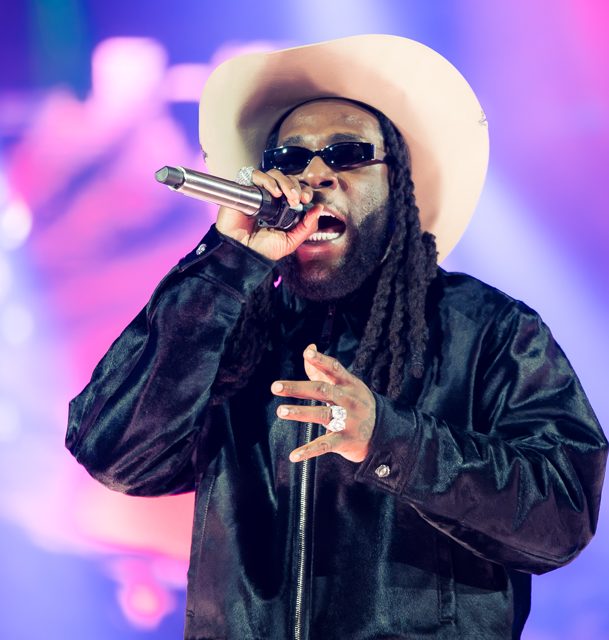 Burna Boy performing on stage