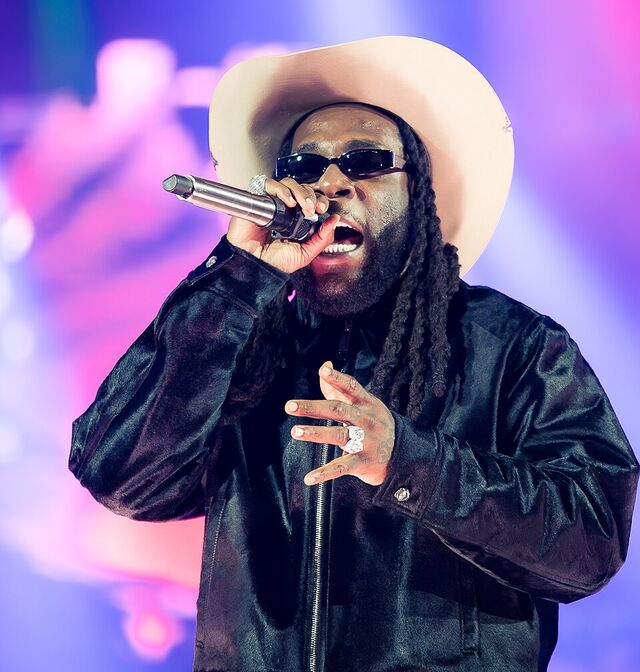 Burna Boy performing on stage
