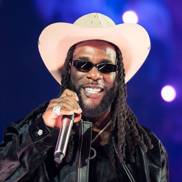 Burna Boy performing on stage