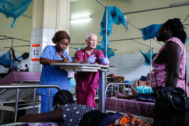 Medics at work in an Ebola observation ward